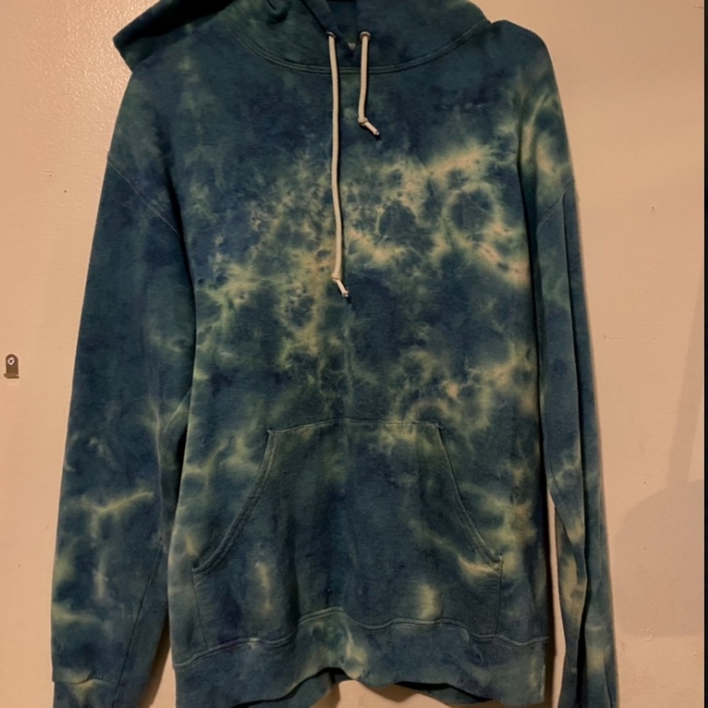 Blue and white sweatshirt, size medium.